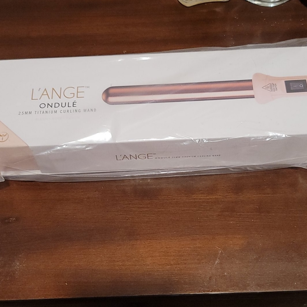 Lange 25mm titanium curling wand never used